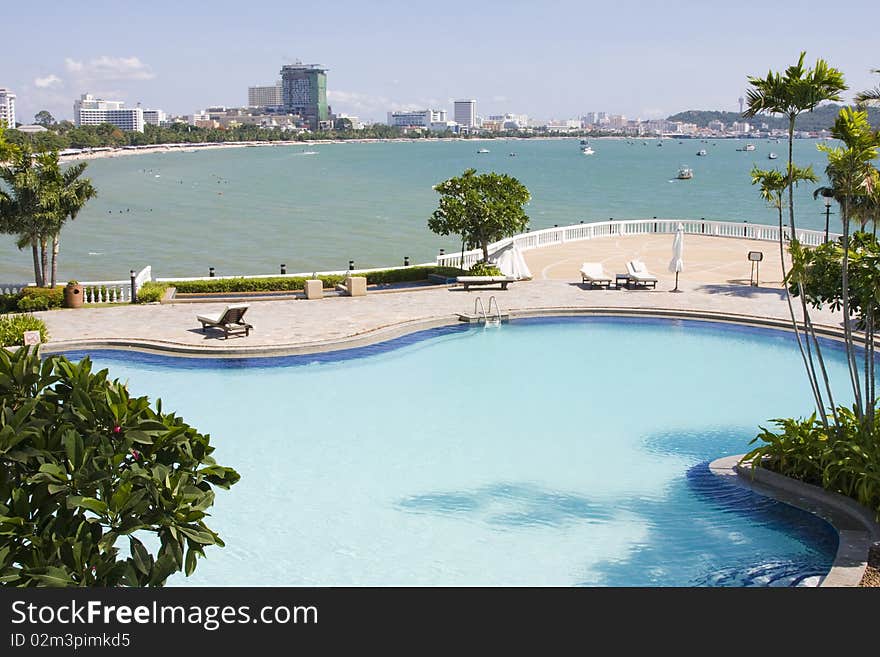 Swimming pool on a sunny day.Pattaya city in Thailand . Swimming pool on a sunny day.Pattaya city in Thailand .