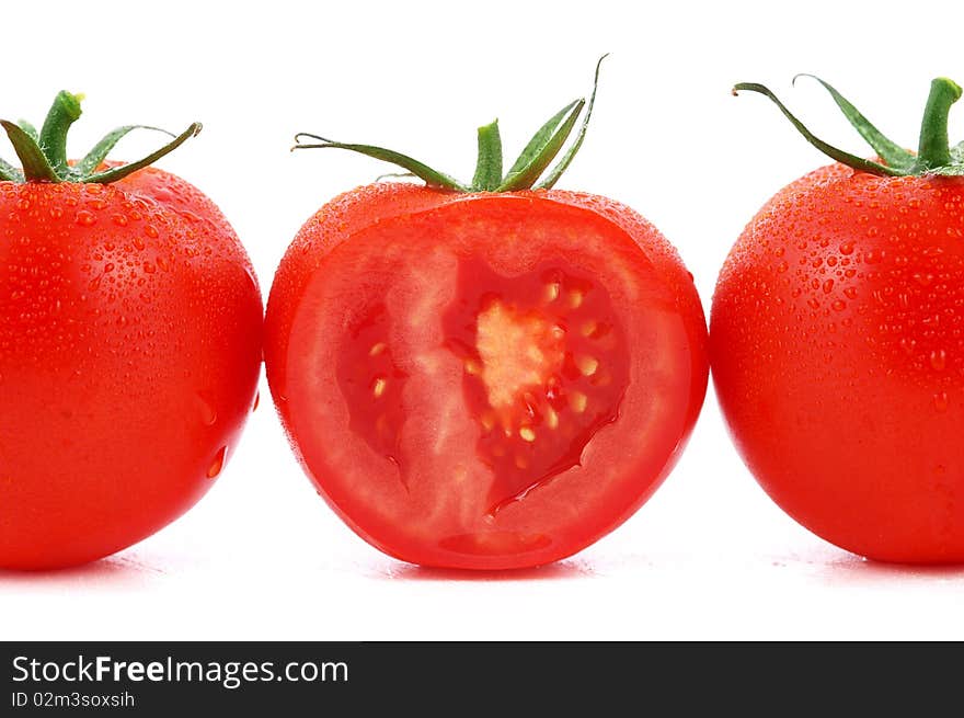 Three red tomato