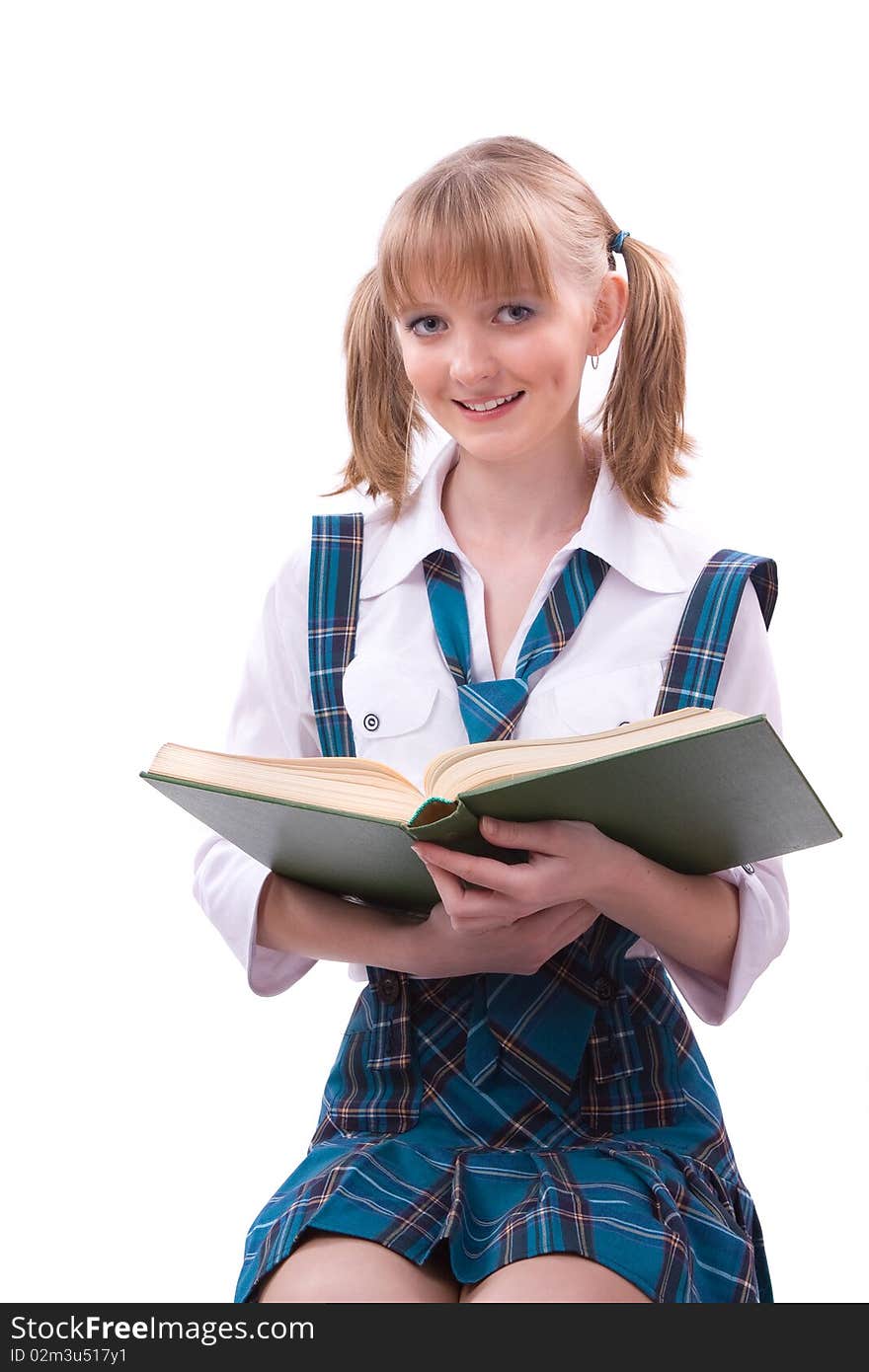 Senior high school student in uniform with documents is sitting on the stack of book. Young and beautiful schoolgirl is wearing a traditional uniform is reading textbook. Senior high school student in uniform with documents is sitting on the stack of book. Young and beautiful schoolgirl is wearing a traditional uniform is reading textbook.