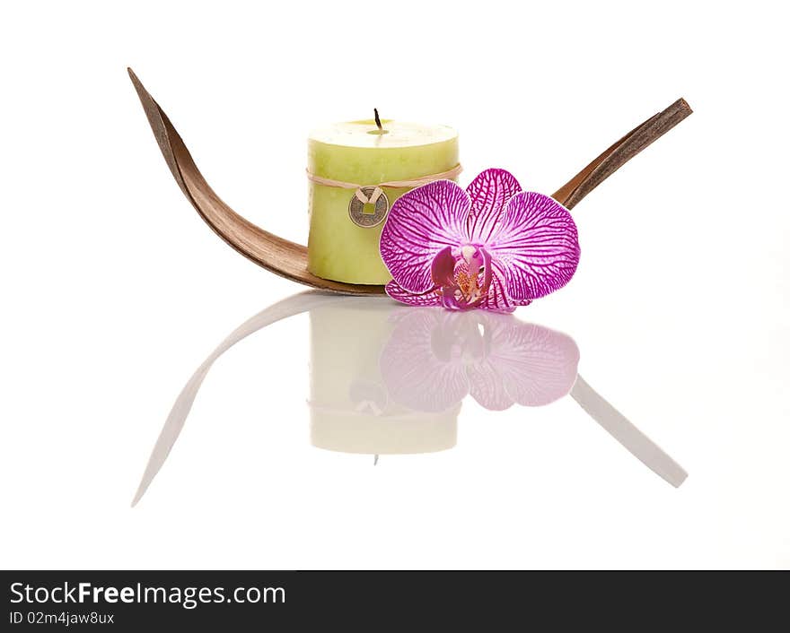 Candle Decorated With Orchid Flower