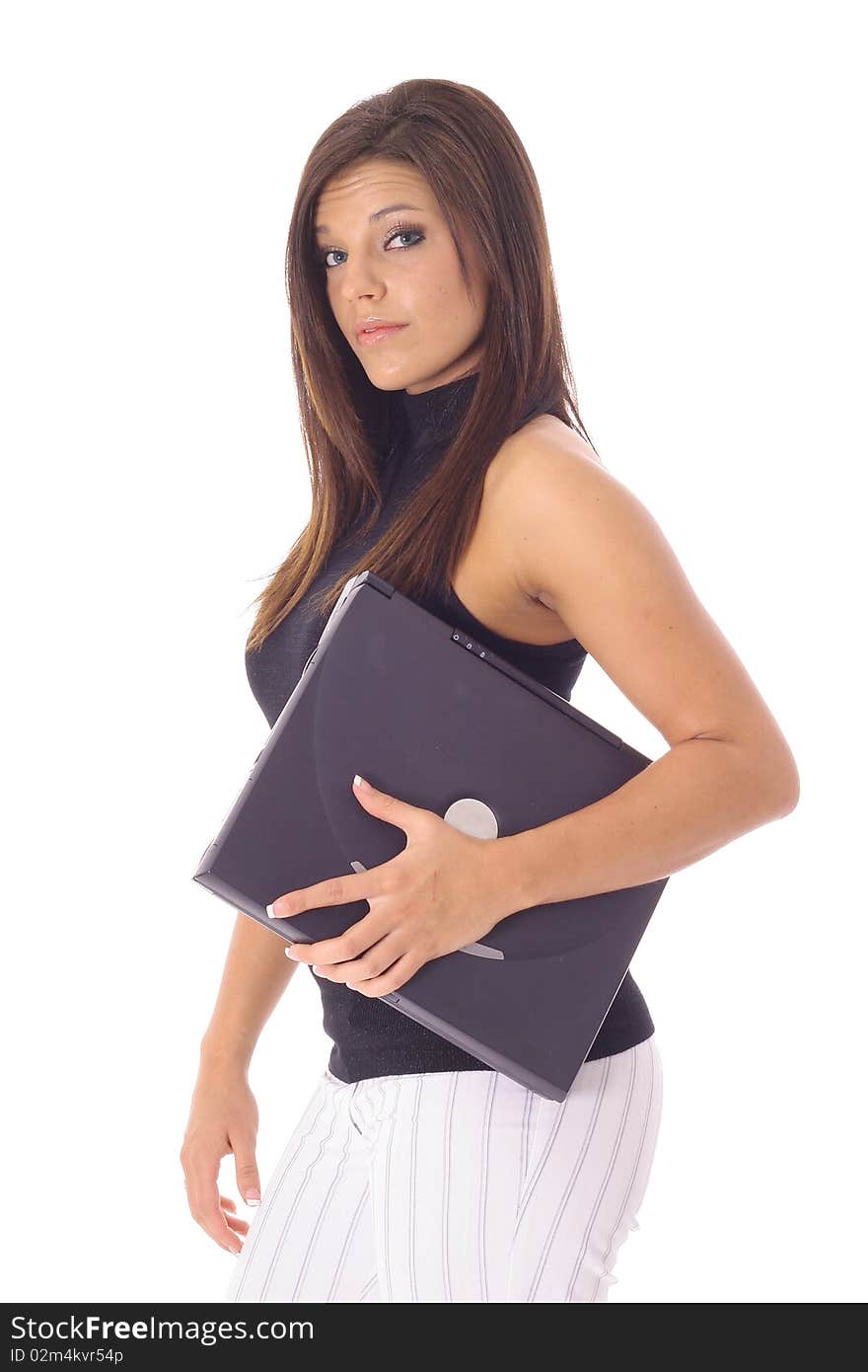 Female student with laptop on the go