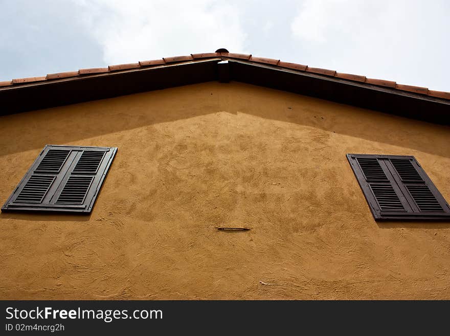 Orange roof of the yellow house