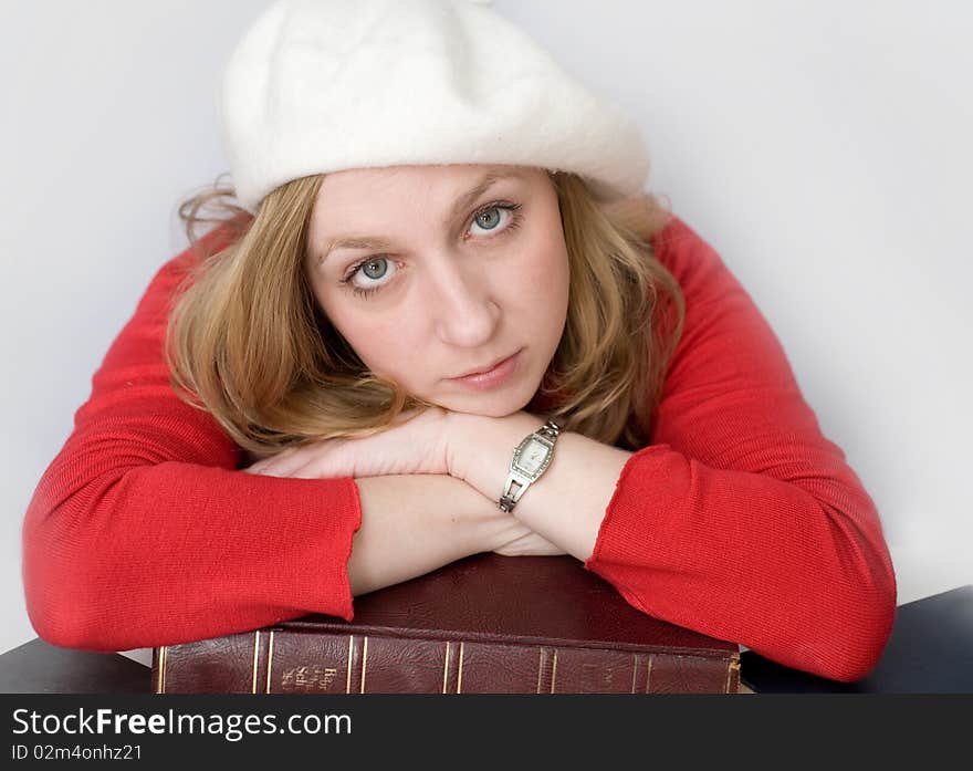 Young woman in white beret