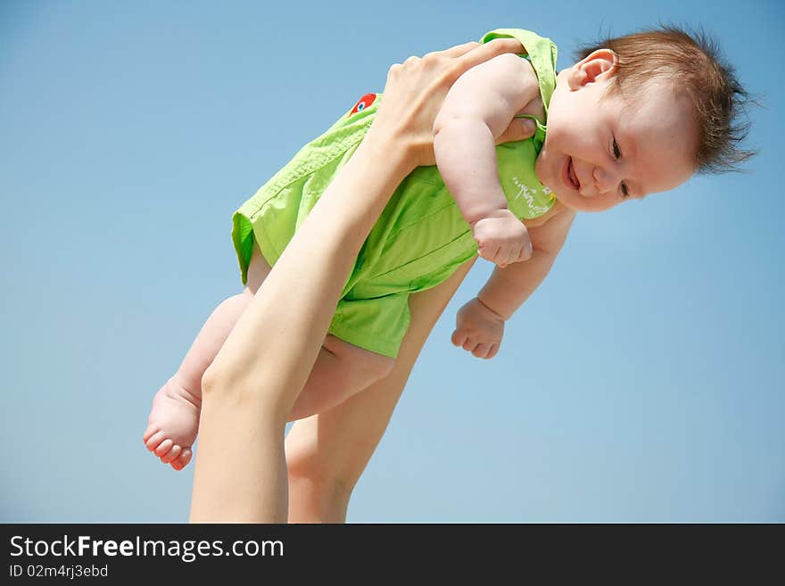 Baby on sky background