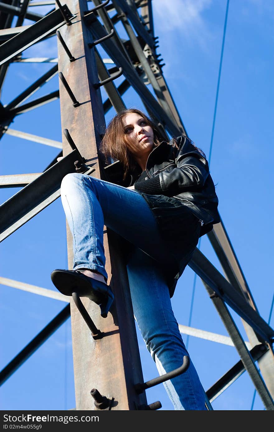 Woman On Electrical Tower