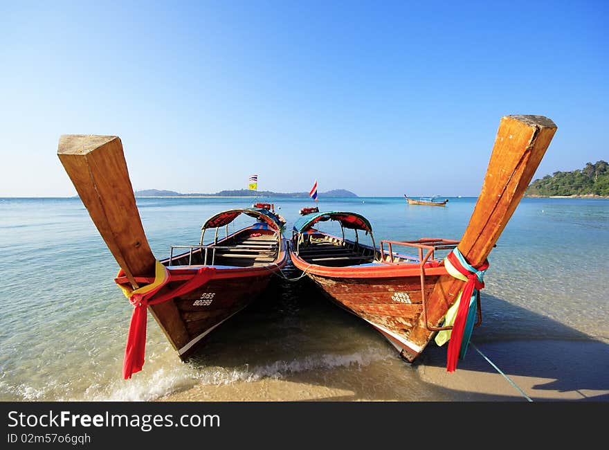 Long tail Boat transit on the beach south of Thailand