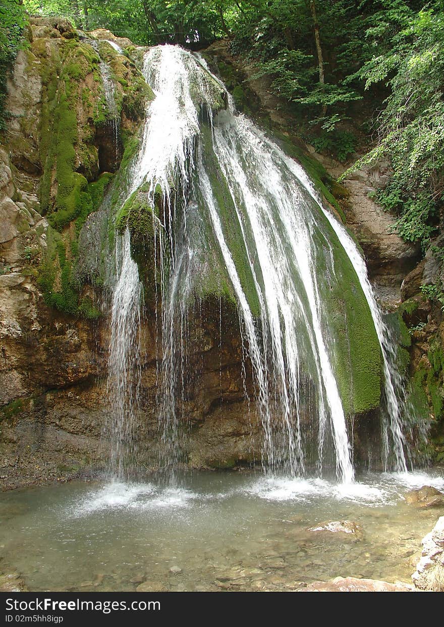 Small fresh waterfall is runing in Crimea