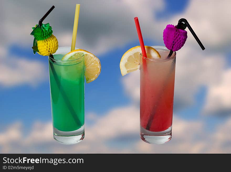 2 cocktails on sky background. 2 cocktails on sky background