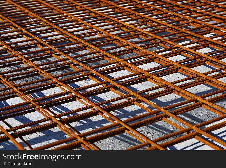 Steel used for Armoring by Constructing reinforced Concrete, Rusty Iron Grid Photo. Steel used for Armoring by Constructing reinforced Concrete, Rusty Iron Grid Photo