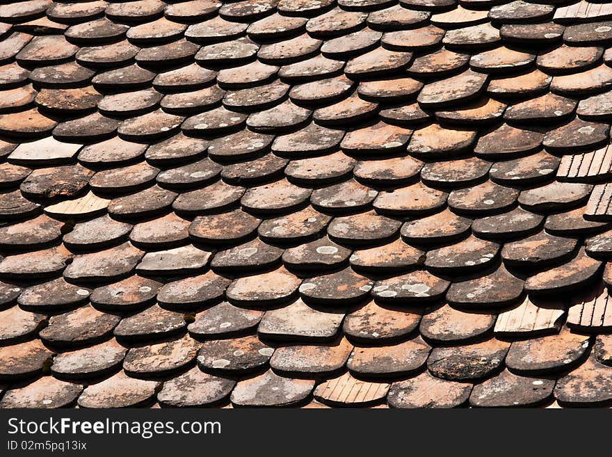 Close up of a old roof ceramic tiles. Close up of a old roof ceramic tiles