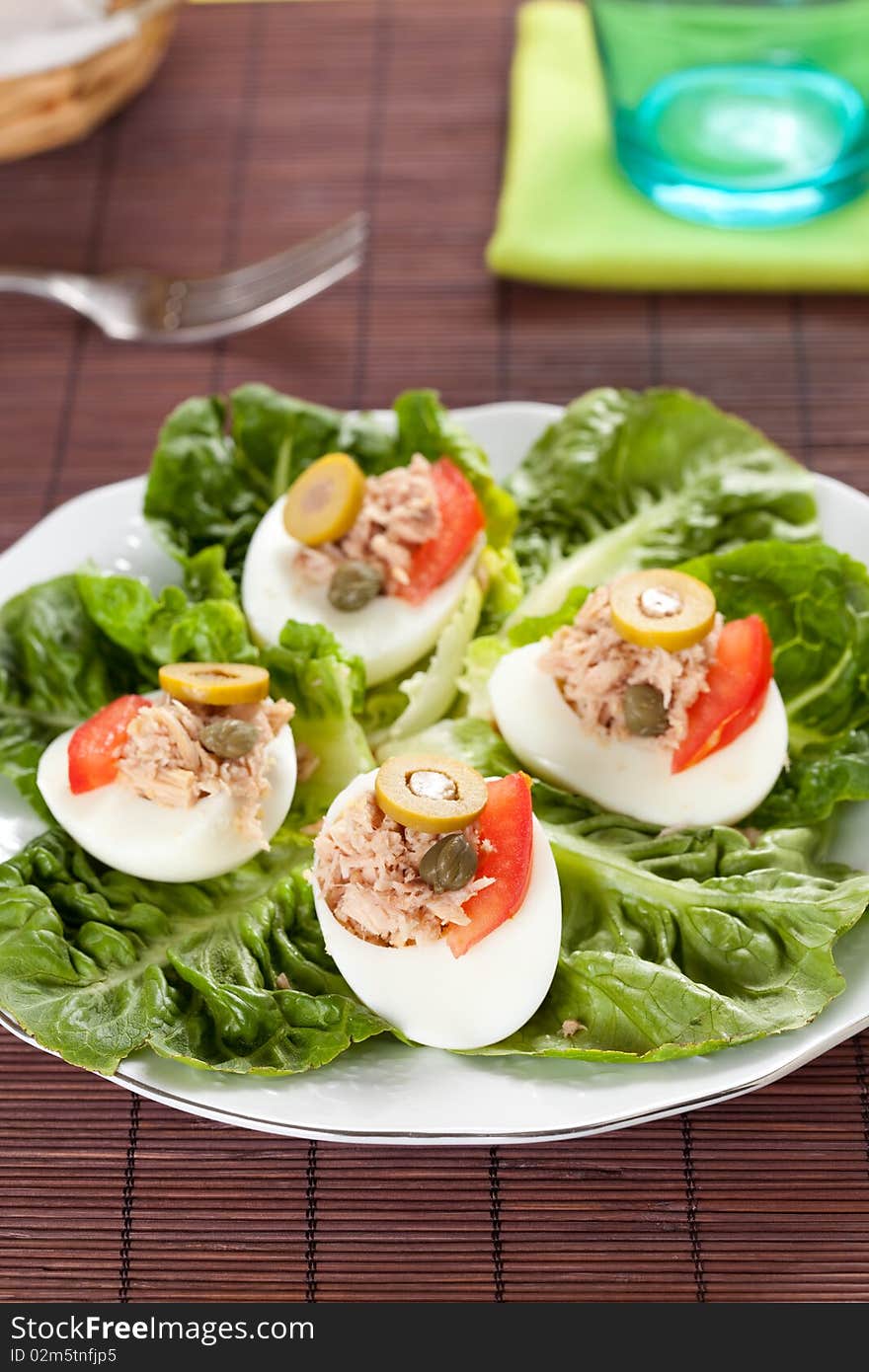 Salad plate of letuce egg tuna and olive. Salad plate of letuce egg tuna and olive