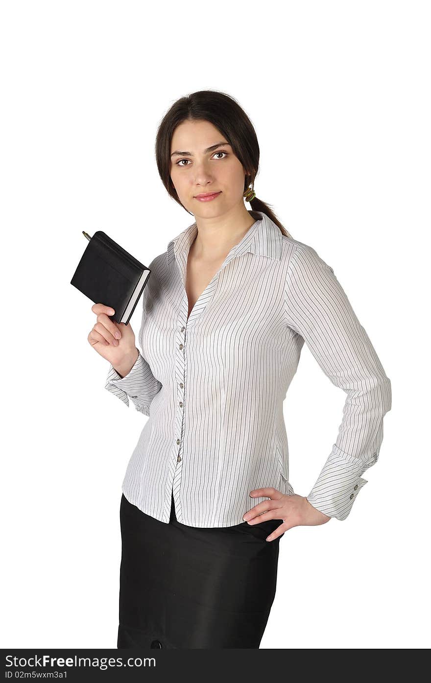 The beautiful business woman with a notebook