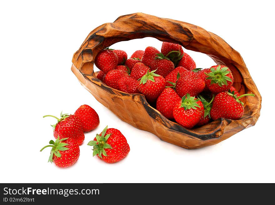 Fresh strawberries in basket isolated on white. Fresh strawberries in basket isolated on white