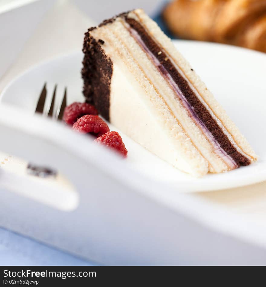 Cake With Raspberries On White Tray