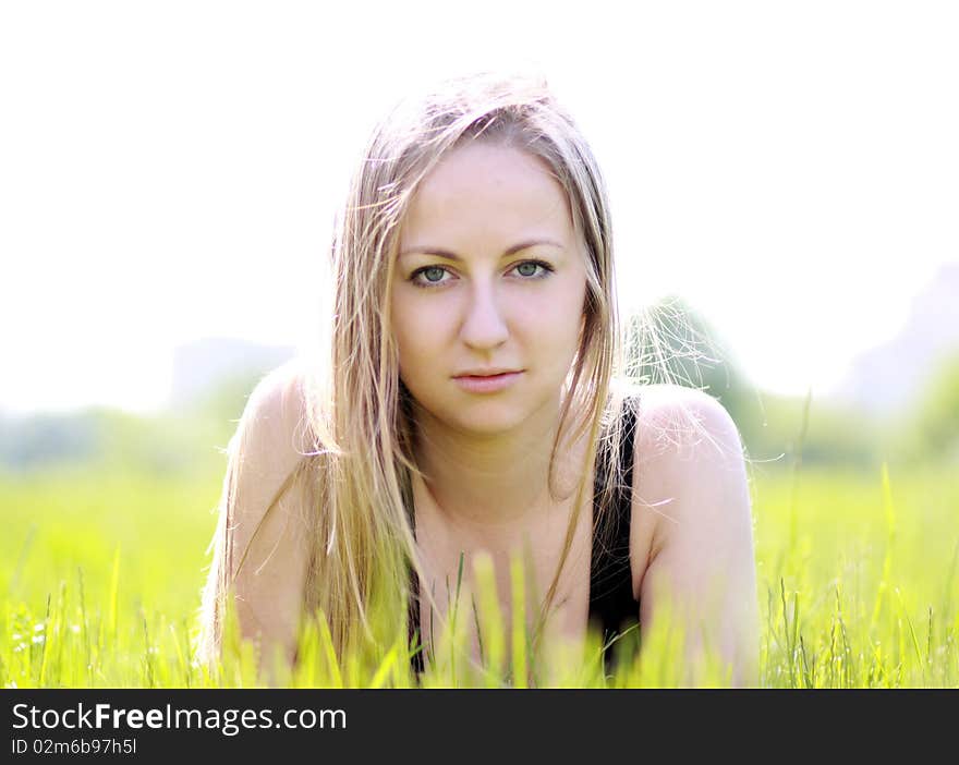 Woman on the green grass. Woman on the green grass