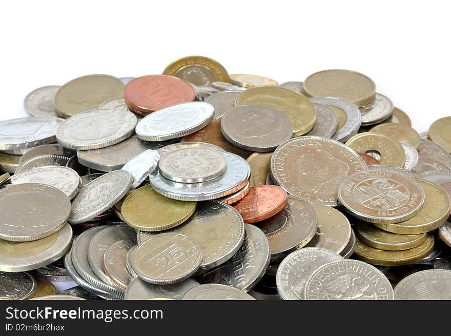 A heap of coins from different countries. A heap of coins from different countries