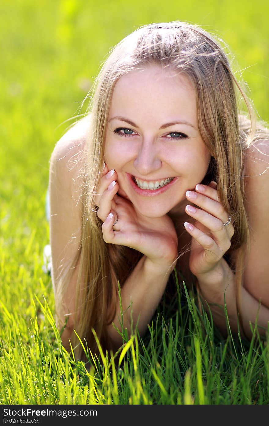 Woman on the green grass