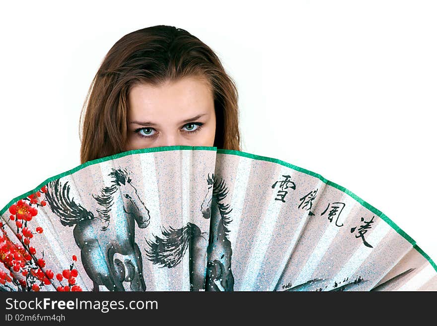 Iloated shy girl with the fan. Iloated shy girl with the fan.