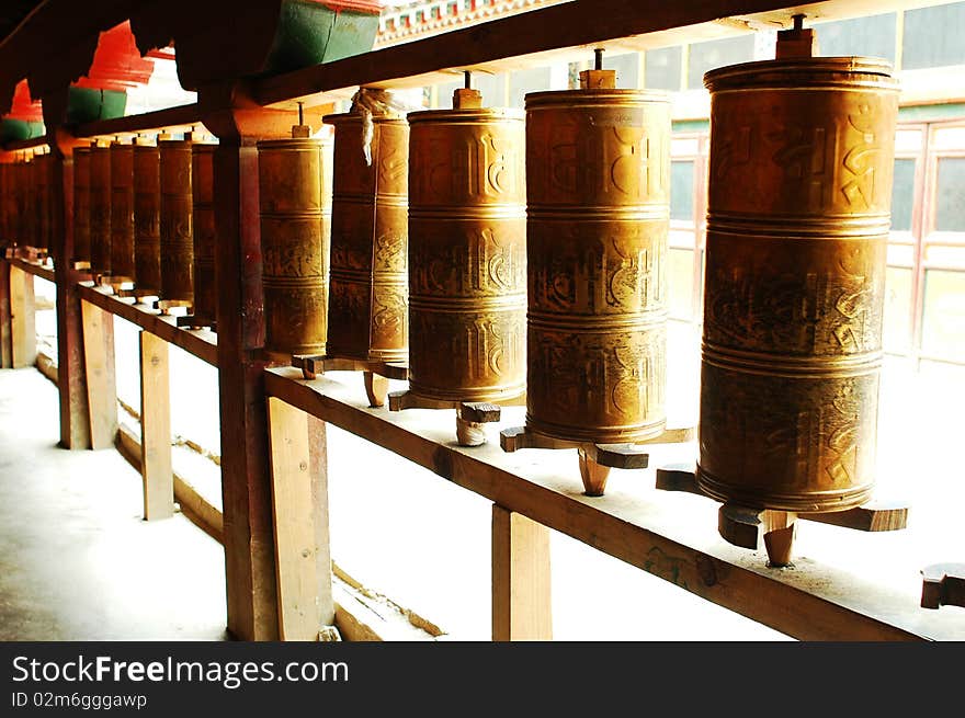 Prayer wheels in a Tibetan lamasery at Lhasa,Tibet. Prayer wheels in a Tibetan lamasery at Lhasa,Tibet