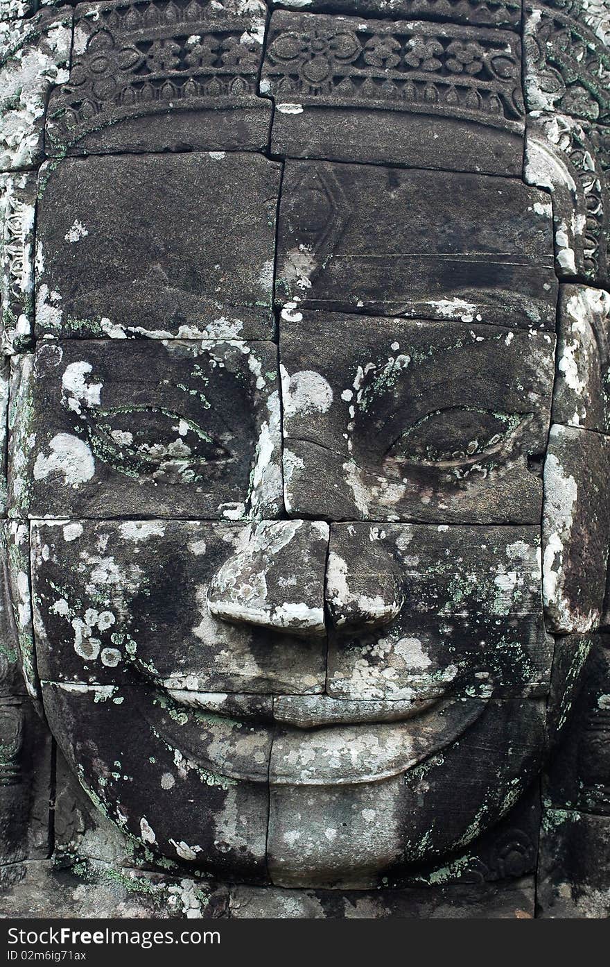 Smiling buddha statue at Angkor,Cambodia