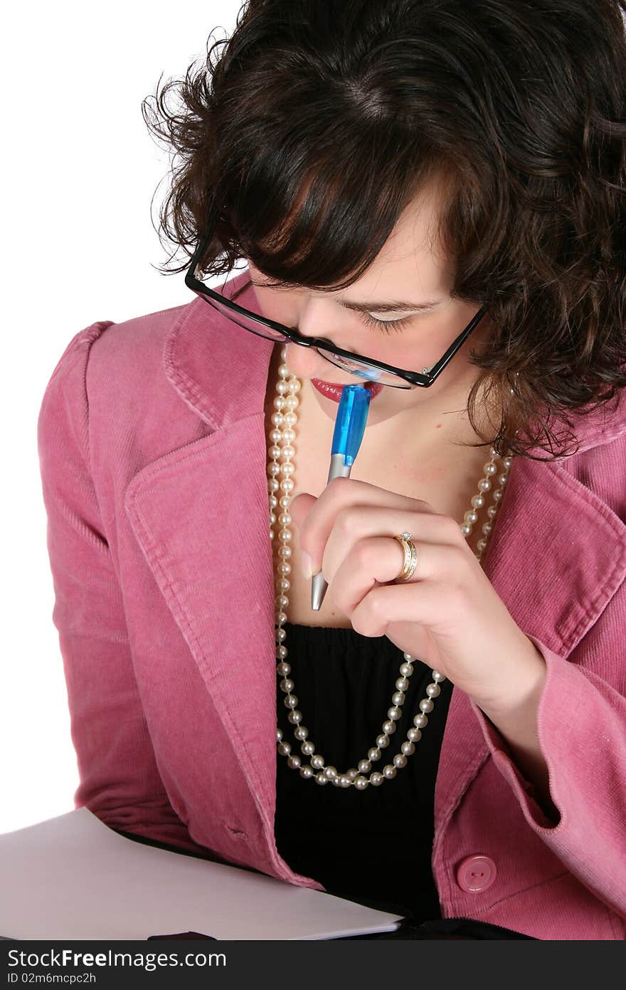 Brunette business woman concentrating on her work