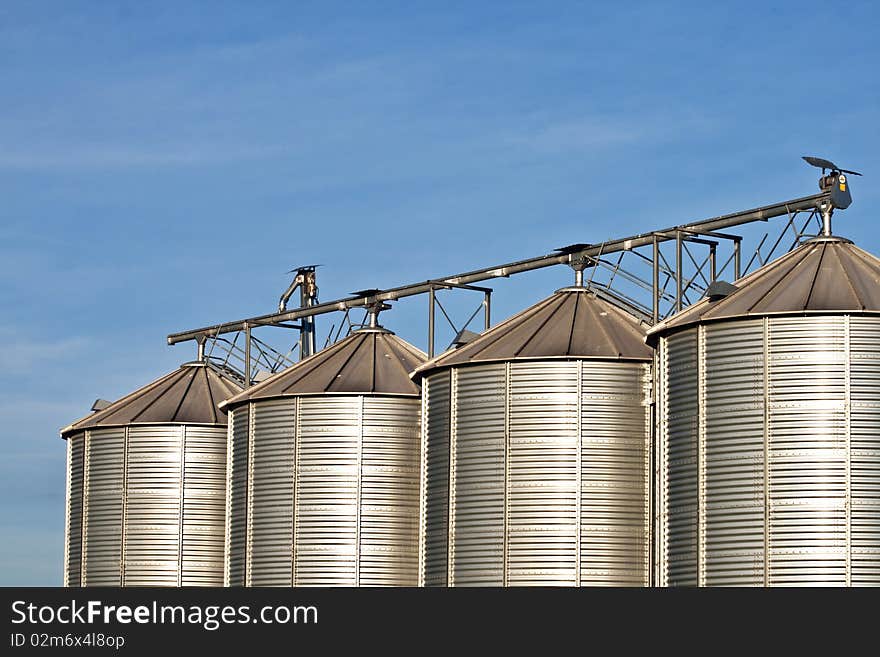 Silos in beautiful landscape and acres