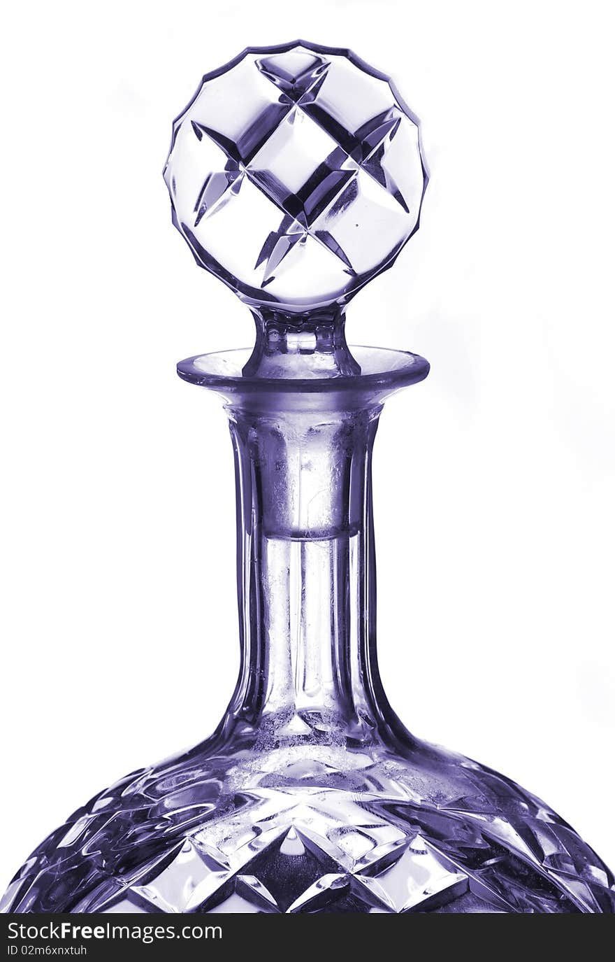 A glass alcohol container / decanter against a white background