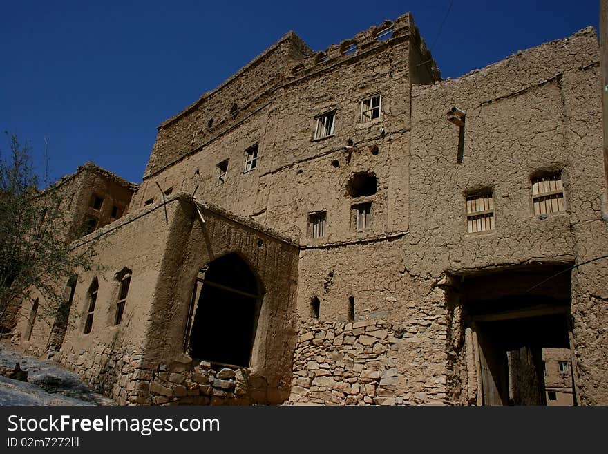 Ruins of old mudflat buildings in the city Biladt Sait in Oman