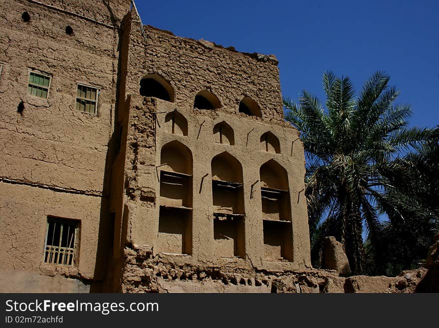 Ruins of old mudflat buildings in the city Biladt Sait in Oman