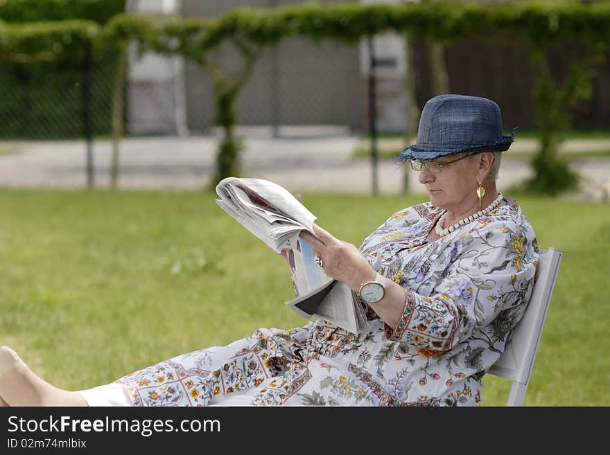 Woman,  mouth wide openeating big spoon ful of cake. Woman,  mouth wide openeating big spoon ful of cake