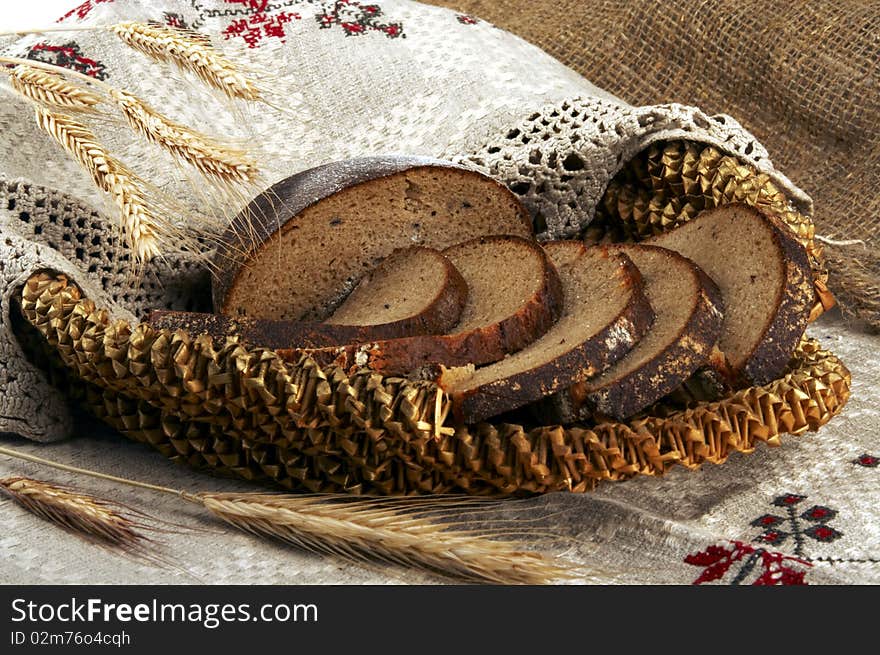 Still-life with bread and ears on a plate