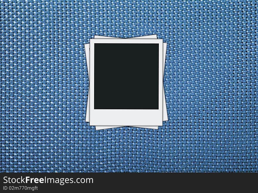 Blank photos on a blue wicker textured background