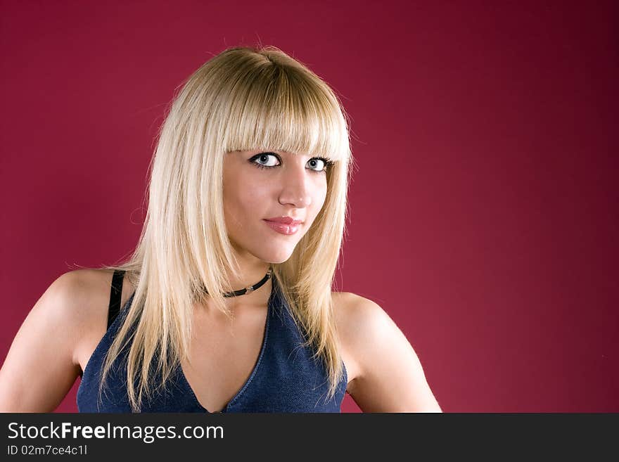 Image of friendly blond over red background