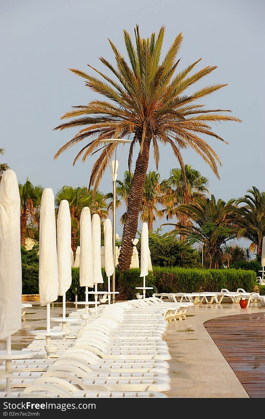 Empty chaise longues after the rain in Turkey