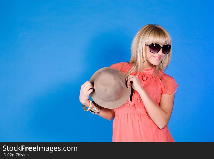 Portrait of a smiling girl with glasses and hat. Portrait of a smiling girl with glasses and hat