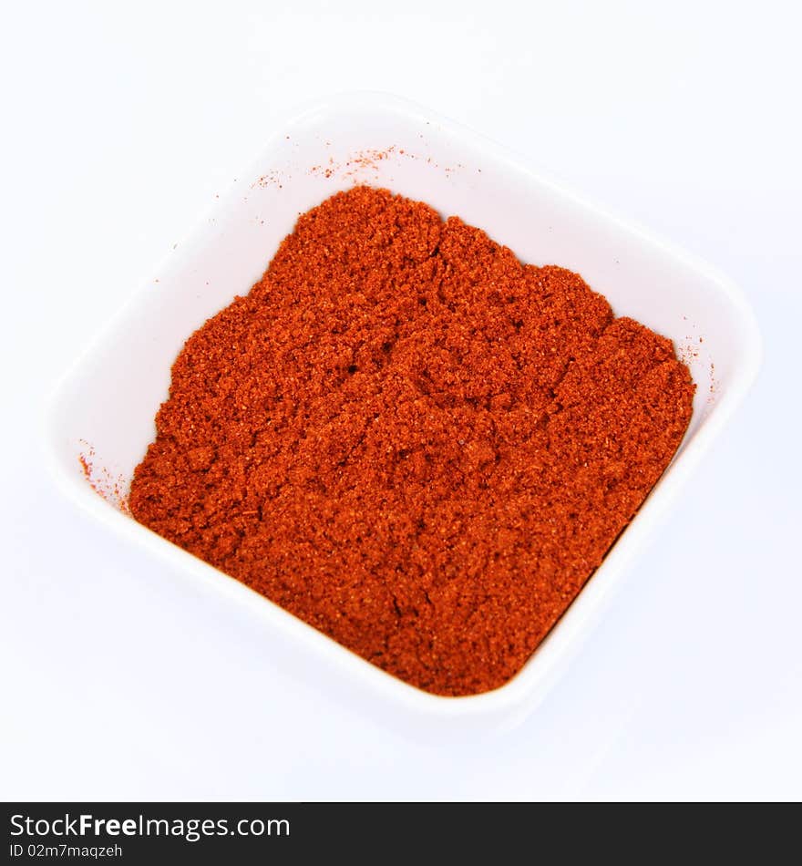 Paprika in a small white bowl