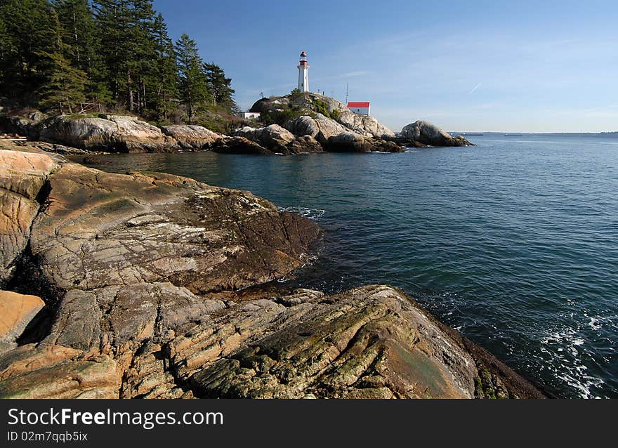 Sea beacon on rocky coast