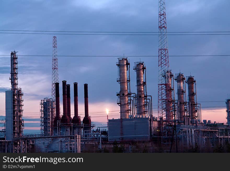 Grangemouth Refinery on a sunset background. oil and gas industry. Grangemouth Refinery on a sunset background. oil and gas industry.