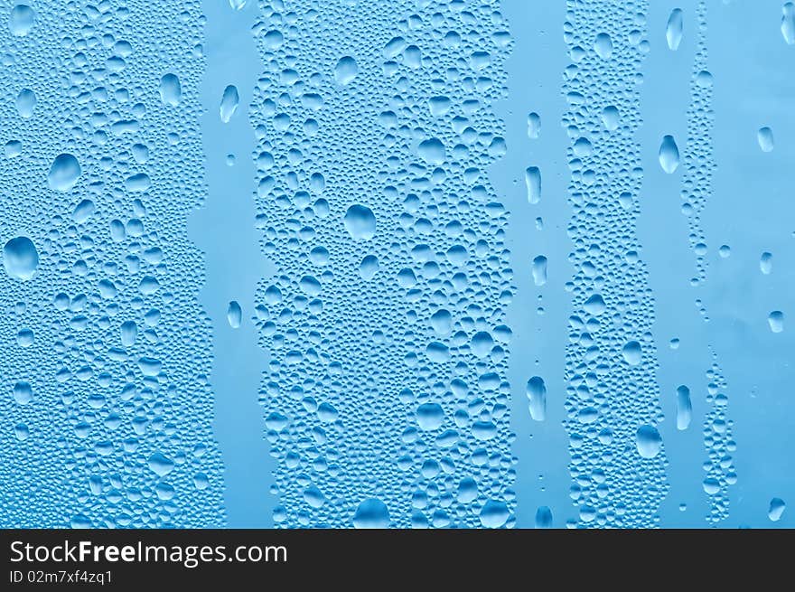 Water bubbles on the window for background. Water bubbles on the window for background