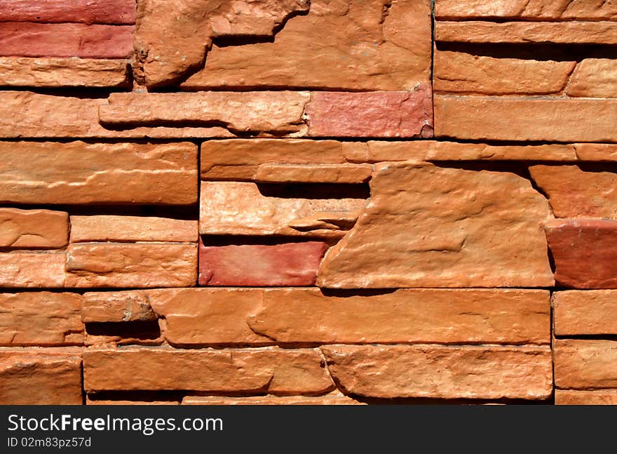 Fine details of a brick wall as texture or for background purposes