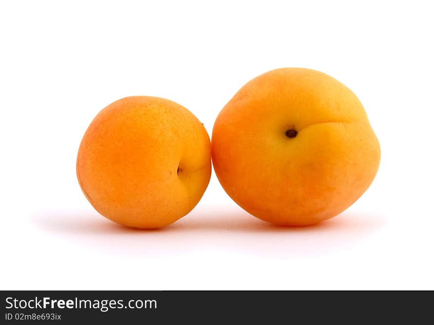 Apricots isolated on white background