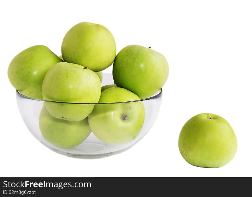 Isolated green apples in a glass bowl