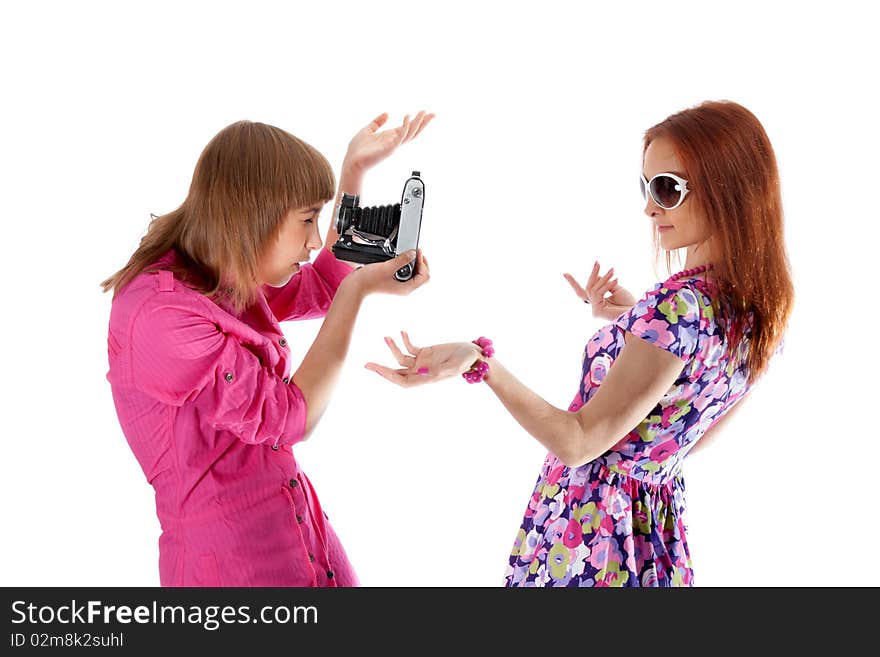 Two girls are taken pictures