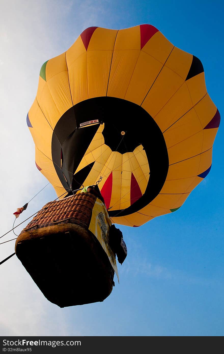 A yellow Balloon was shot while in the air. A yellow Balloon was shot while in the air