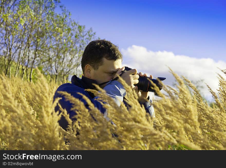 Young  photographer on Gold meadow