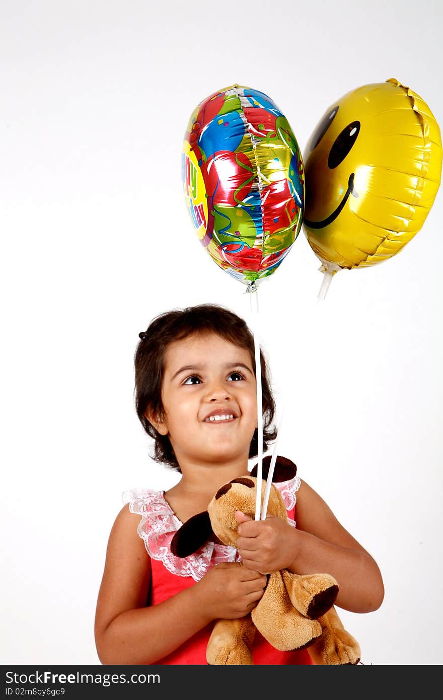 Sweet and cute toddler playing with ballons. Sweet and cute toddler playing with ballons