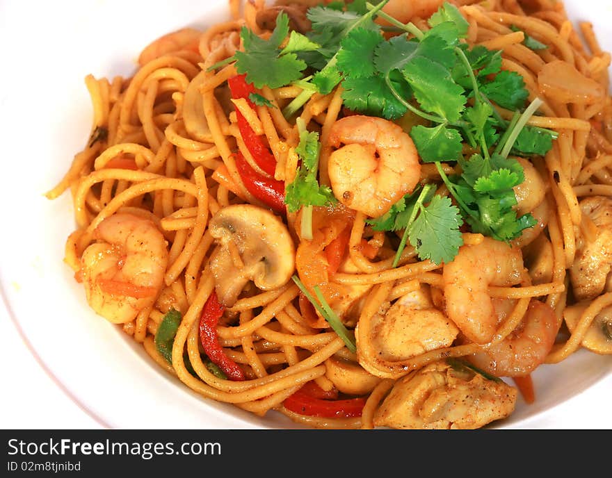 Stir fried Spaghetti isolated with white background