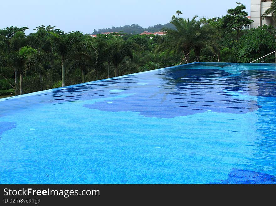 Swimmin pool in a resort, clean and bright water. Swimmin pool in a resort, clean and bright water