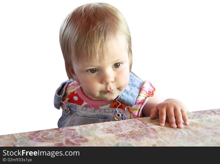 The Child Behind A Table