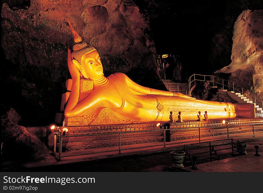 Reclining Buddha image in the cave